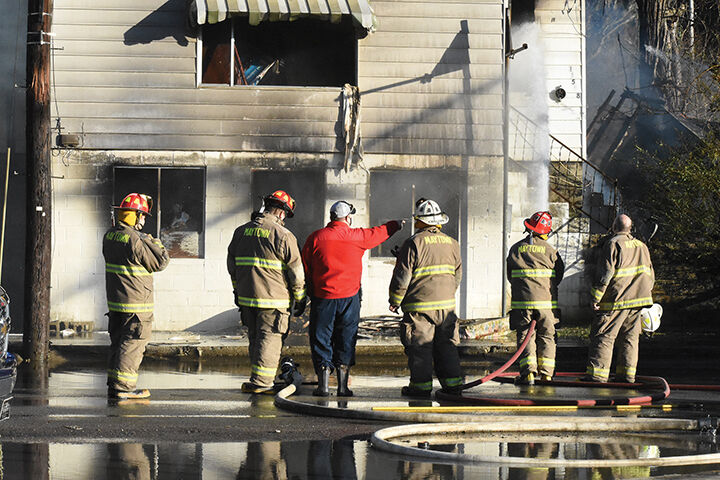 Emergency personnel respond to structure fire in Martin
